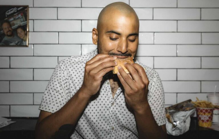 diner eating burger