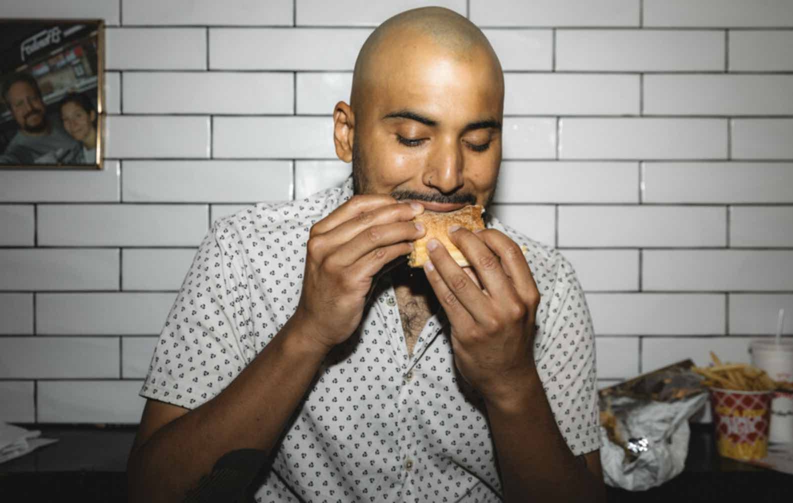 diner eating burger