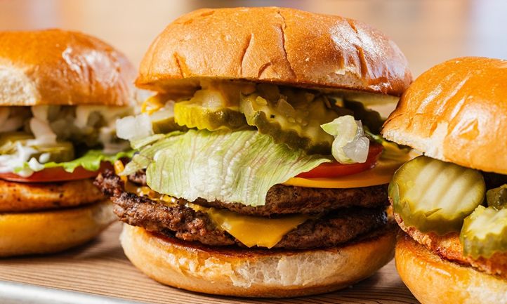 Hat Creek Grills Up Lifetime Supply of Free Burgers for Returning Texas Defensive Coordinator Will Muschamp