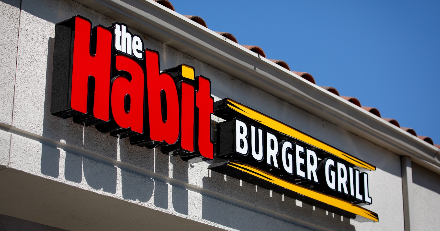 Why did Yum Brands buy Habit Burger?
