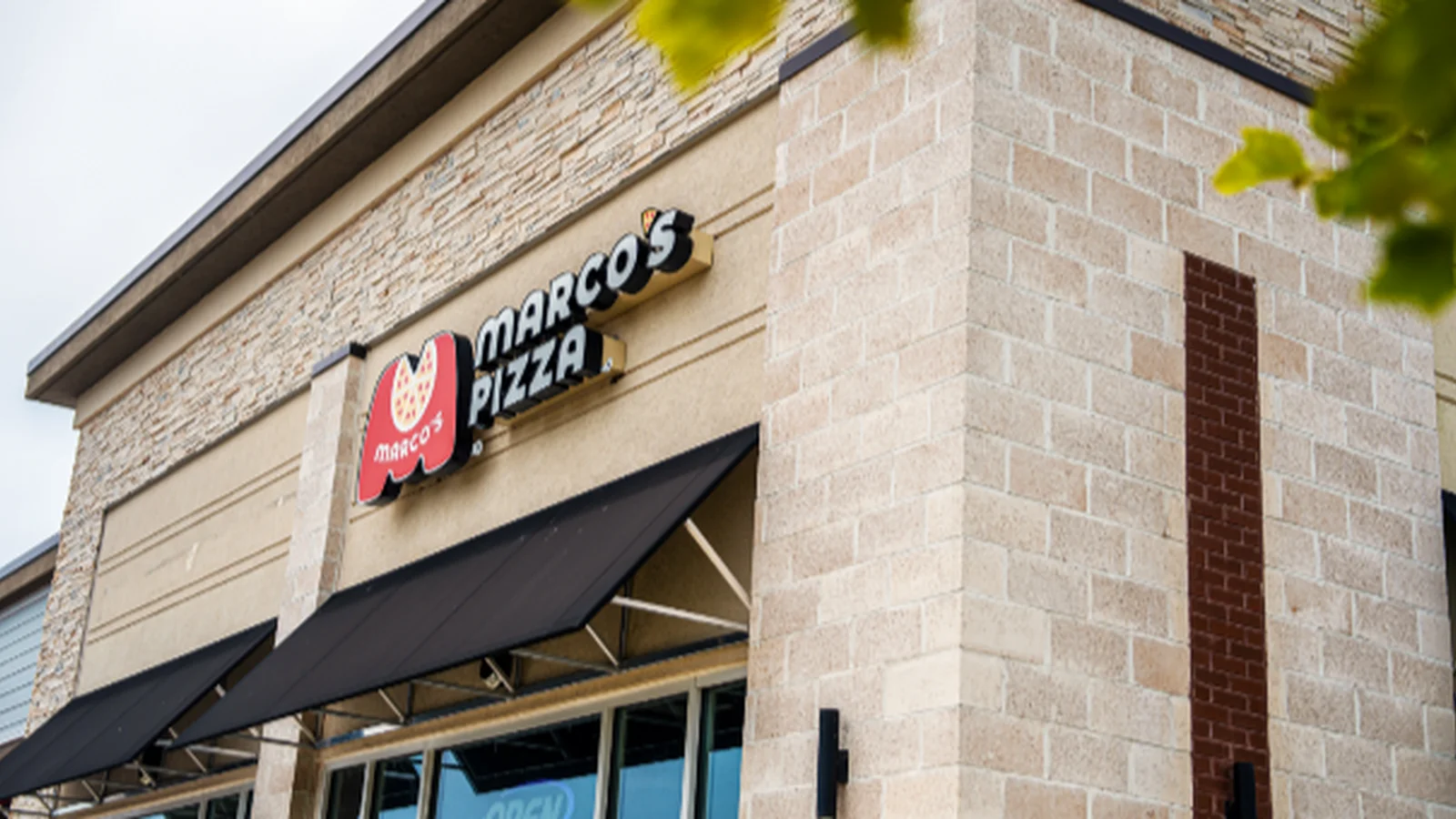 Largest Marco's Pizza franchisee HRG acquires 5 stores